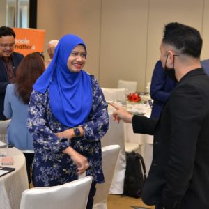 Safinas Mohd Ibrahim (AXA Affin Insurance) in a conversation with Haikal Akmar (UOA Group).